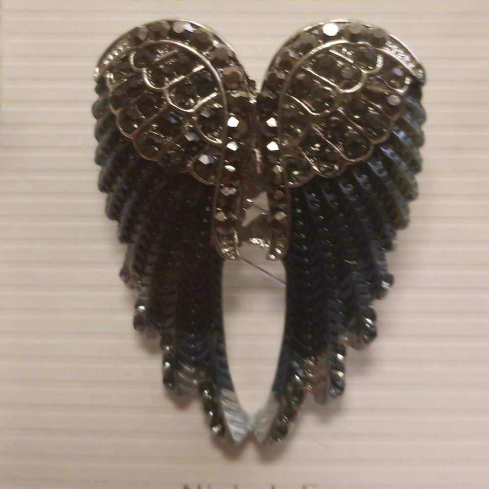 Brooch.